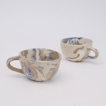 Set of two handmade marbled ceramic espresso cups with matte clear glaze